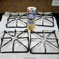 a can of bar keepers friend sits on top of the stove burners that are covered in snow