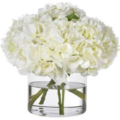 white flowers are in a clear vase on a white background, the centerpiece is filled with water