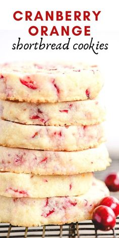 cranberry orange shortbread cookies stacked on top of each other