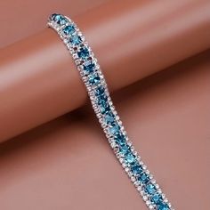 Rhinestone Decor Bracelet Blue Crystal Bracelets For Formal Occasions, Adjustable Blue Bracelets With Sparkling Stones, Blue Crystal Bracelet With Rhinestones For Party, Blue Rhinestone Crystal Bracelet For Party, Blue Crystal Bracelet With Rhinestones, Blue Crystal Bracelet With Sparkling Stones, Elegant Blue Crystal Bracelet With Sparkling Stones, Elegant Adjustable Light Blue Crystal Bracelet, Elegant Light Blue Adjustable Crystal Bracelet