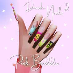 the nails have different designs on them and are painted with colorful nail polishes,