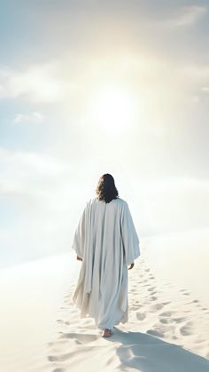 jesus walking in the snow with his arms wrapped around him as he walks toward the sun