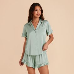 Discover the ultra-comfy short sleeve pajama set, complete with a ruffle trim and available in Sage. Shop now at Birdy Grey. This ruffled PJ set is the perfect getting ready look, with a flirty, feminine twist. | Sage Getting Ready Size Small | Birdy Grey Esther Ruffled Short Sleeve Pajama Set Pajamas Short, Birdy Grey, Comfy Shorts, Ruffle Shorts, Sleepwear & Loungewear, Pj Sets, Birdy, Ruffle Trim, Getting Ready