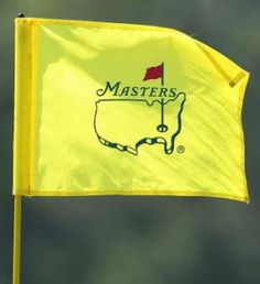 a yellow flag with the masters logo on it