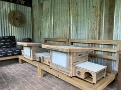 two wooden benches sitting next to each other