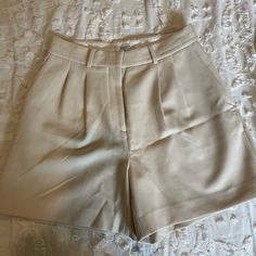 Size 4 Classic Pants With Short Inseam For Spring, Chic Fitted High Waist Bermuda Shorts, Elegant Spring Bottoms With Short Inseam, Elegant Short Inseam Bottoms For Spring, Classic Short Pants For Spring, Elegant Wide Leg Beige Shorts, Elegant Fitted Shorts With Pockets, Elegant Short Inseam Workwear Pants, Elegant Fitted Bermuda Shorts For Spring