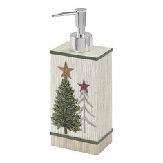 a soap dispenser with a christmas tree and stars on the front,