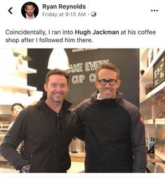 two men standing next to each other in front of a coffee shop sign and smiling