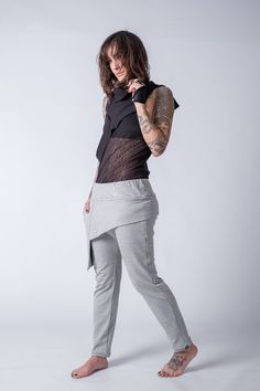 Drop crotch cargo pants/Urban womens cargo style pants Our kind of cargo pants ! An amazing and so comfy design made of heavy cotton lycra , overlayed skirt with pockets giving the cargo style we love , elastic waistband and low crotch .For those days that you just dont want to make any effort but still look edgy and lovely! Skirt Overlay Pants, Cyberpunk Pants, Low Crotch Pants, Womens Cargo, Split Long Dress, Apocalyptic Fashion, Collar Vest, Harem Pants Women, Asymmetrical Blouse