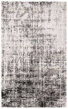 a black and white rug with an abstract design on the bottom, in shades of gray