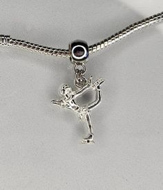 Ice Skater Charm, Ice Skates Charm, Ice Skating Charm, One Sided Charm, Dangle Charm  Fits Pandora plus all Designer and European charm bracelet, fits snake chain bracelets and necklaces. **Charm: 19X21mm Bail: 11x8mm Hole: 4.7mm   Zinc Alloy **Free USA domestic shipping after spending a specific amount (not including tax and shipping).  See shop announcement for free shipping info. **All orders are shipped immediately from Athens Ohio.  If there is an exception to this it will be posted in the Athens Ohio, Ice Skater, Ice Skaters, Ice Skate, Ice Skates, Snake Chain Bracelets, Silver Plated Jewelry, Dangle Charms, Pandora Bracelet