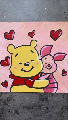 a drawing of winnie the pooh and piglet hugging each other with hearts flying around