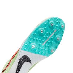 the sole of a tennis shoe with spikes on it's outstretches