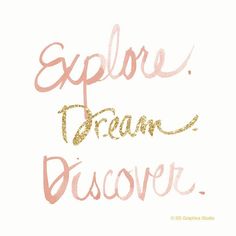 the words explore dream discovery written in pink and gold ink on a white paper background