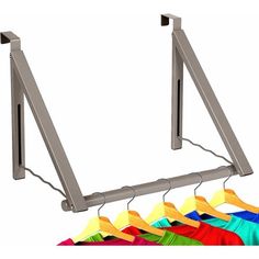 the clothes hanger is made from metal and holds several different colored shirts on it