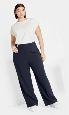 Create a chic and effortless look with the Yasmine Pant. Perfect for your everyday style, slip into its high rise fit, full length design and relaxed silhouette. Key Features Include: - High rise fit - Double hook and zip fly closure - Double belt loops - Side sateen fabrication detail - Relaxed silhouette - Pull on style - Full length Accessorize with a statement belt. | Plus Size Yasmine Pant in Navy, Size 24 | City Chic | Plus Size Yasmine Pants in Navy, Size 24 | City Chic Chic 4-way Stretch Bottoms For Workwear, Chic 4-way Stretch Wide Leg Pants For Business Casual, Relaxed Fit Elastane Wide Leg Pants For Work, Chic Relaxed Fit Bottoms For Office, Chic Straight Pants With 4-way Stretch, Resort Wear Dresses, Chic Plus Size, Double Belt, Statement Belt