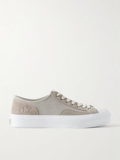 These low-tops from Givenchy’s 'City' line are a cool, understated take on classic tennis styles. Made from heavyweight canvas, they have contrasting leather tongue tabs, logo-debossed suede trims and brushed silver-tone plaques at the heels. Givenchy Shoes, City Logo, Canvas Sneakers, Suede Sneakers, Sport Running, Suede Jacket, Suede Shoes, Weekender Bag, Belt Bag