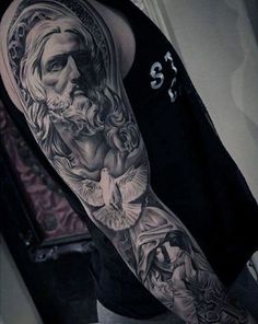 a man with a tattoo on his arm