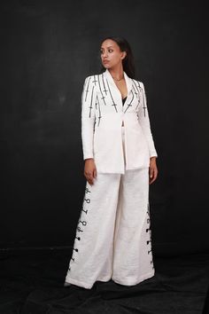 Crafted with organic cotton fabric for superior comfort and style, this exquisite coat and trouser set elevates Habesha fashion and design to another level. Decorated with intricate black embroidery and Habesha cloth (የሀበሻ ልብስ), this ensemble is perfect for any event and office use, ensuring you stand out in any wardrobe. Experience the sophistication of Modern Habesha cloth with this statement-making coat and trouser combination. Black Embroidery, Fashion And Design, Organic Cotton Fabric, Bosnia And Herzegovina, Embroidery Design, Embroidery Designs, Organic Cotton, Cotton Fabric, Embroidery