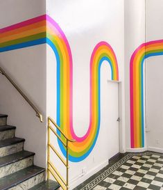 the stairs are painted with different colors and patterns