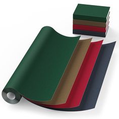 several different colors of paper on top of each other, with one folded up in the middle