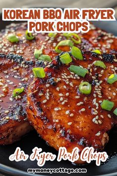 korean bbq air fryer pork chops on a black plate with sesame seeds