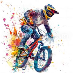 a man riding a bike with colorful paint splatters