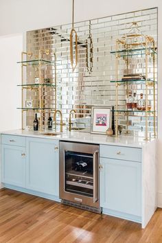 Stunning new wet bar
mirrored subway tile backsplash 
quartz countertops 
brass framed shelves @soilandoak/_created/
Birds Egg cabinet color @benjamin_moore/_shop/

photo credit: @easterdaycreative/_created/ French Vintage Decor, Bar Mirror, Living Room Bar