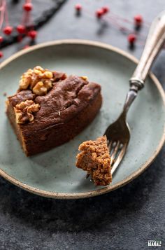 a piece of cake on a plate with a fork