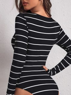 Make a statement in this Striped Scoop Neckline Bodysuit. Perfect for a casual day out or a night in, this bodysuit features an all-over striped print in a flattering scoop neckline and rib-knit details for an extra touch of style. With its long sleeves and natural waistline, this bodysuit is sure to give you a confident look all day long. Features: Style: Casual Pattern Type: Striped Neckline: Scoop Neck Sleeve Length: Long Sleeve Sleeve Type: Regular Sleeve Waist Line: Natural Fit Type: Slim Fit Fabric: High Stretch Composition: 95% Polyester, 5% Elastane Body: Unlined Sheer: No Size Chart (Inches): Product Measurements Size US Bicep Length Bust Cuff Hip Size Length Sleeve Length Waist Size XS 2 9.7 29.9 6.7 26.8 27.4 23.2 24.8 S 4 10.2 31.5 7.1 28.3 28 23.6 26.4 M 6 10.8 33.1 7.5 29.9 2 Comfy Jumpsuits, Black Bodysuit, Night In, Scoop Neckline, Jumpsuits For Women, Trendy Fashion, Rib Knit, Scoop Neck, Length Sleeve