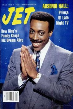 a man in a suit and tie on the cover of jet magazine, with his hands clasped