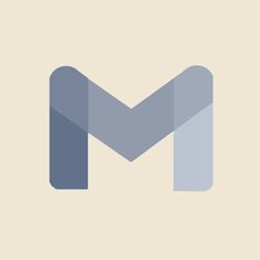 the letter m is made up of blue and gray shapes on a light beige background