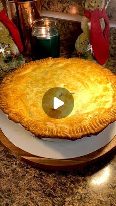 a pie sitting on top of a white plate