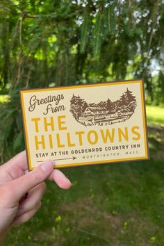 someone is holding up a business card for the hills country inn in washington, d c