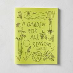 a garden for all seasons coloring book on a white surface with green markers and black ink