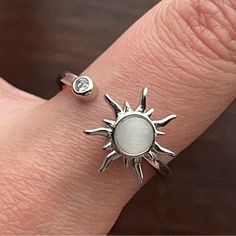 Silver Sun Fidget Ring Adjustable Silver Ring With A Moonstone Sun That Spins When You Twist It And Cz Crystal. New To Poshmark? Sign Up Now With My Code: Mobeautybae To Save $10 On Your First Order. Relatable Searches: Silver Sun Ring, Sun Ring, Silver Ring, Statement Ring, Adjustable Ring, Fidget Ring, Moonstone Ring, Anxiety Ring, Adhd Ring, Spinning Ring, Ring That Spins, Blue Tanzanite Engagement Ring, Ring Spinning, Sun Ring, Dainty Wedding Ring, Tanzanite Engagement Ring, Spinning Ring, Ring Moonstone, Classic Wedding Rings, Beautiful Wedding Rings