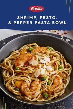 shrimp, pesto and pepper pasta bowl with text overlay reading shrimp pesto and pepper pasta bowl