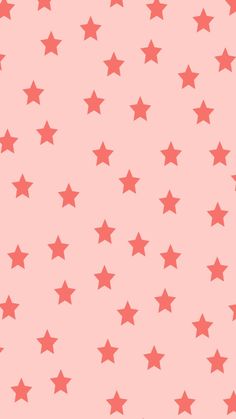 a pink background with red stars on it