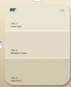 the paint swatches are showing different shades of beige and light brown, with white trim