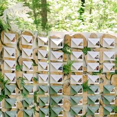 several pieces of wood are stacked on top of each other in order to make a wall decoration