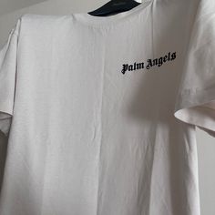 Palm Angels T-Shirt (Size: Small) Light Cream This Is An Authentic Palm Angels Men's Size Small T-Shirt New Without Tags. There Is A Pin Size Hole Which You Cannot Notice Unless You Know It Was There. This Was Created From Ripping The Tags Off. As You See In The Photos You Will Not See Any Holes What So Ever. Other Than That The Shirt Is Brand New Just Missing The Tags. Palm Angels Teddy Bear T Shirt, Cheap White T-shirt With Palm Tree Print, Black Palm Angels T Shirt, Palm Angels Hoodie White, Palm Angels White Tshirt, Angel Shirt, Angel Man, Baby G, Light Cream