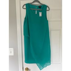 Pretty Chiffon Dress In A Gorgeous Jewel Tone Teal-Y Green. Would Be Great For A Semi Formal Event, Church, Or Even For Work. Nwt Sleeveless Chiffon Dress With Overlay, Green Flowy Dress For Work, Summer Chiffon Workwear Dresses, Summer Chiffon Dress For Work, Flowy Chiffon Dress For Workwear, Flowy Sleeveless Dress For Work, Be Great, The Limited, Chiffon Dress