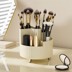 PRICES MAY VARY. 360° Rotation: The cosmetic brush holder can rotate 360° smoothly, which makes put in and take out brushes very convenient, it can improve makeup efficiency, keep your dresser tidy and organized. 5 Slots Design: Open design, divided and classified storage, different height compartments can accommodate your brushes of different lengths, makes your items clear at a glance. Large Capacity: Rotating brush organizer provide you enough space to storage makeup brushes, lipsticks, eyebr Stitch Makeup Brush Holder, Makeup Area, Makeup Brush Organization, Makeup Brush Storage, Beauty Organization, Cosmetic Display, Favorite Makeup Products, Vanity Decor, Makeup Brush Holders