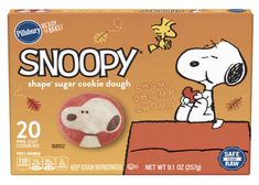 a box of snoopy shaped cookie dough with an image of a dog on it