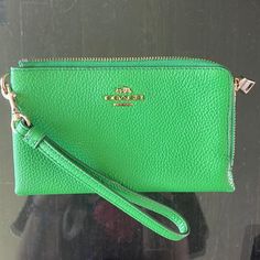 6.5 Inches X 4 Inches. Perfect Condition. Never Used. No Wear Or Tear. Two Zipper Compartments. Great To Use As An Everyday Wallet Or Small Wristlet Going Out. Smoke Free Home. Price Negotiable Green Travel Wristlet With Zipper Pouch, Green Coach Wallet For Everyday Use, Coach Green Wallet For Everyday Use, Green Pouch Wristlet For Daily Use, Green Zipper Wallet Pouch, Green Rectangular Wristlet With Zipper Pouch, Elegant Green Pouch Wallet, Green Zipper Clutch Wallet, Everyday Green Rectangular Wristlet