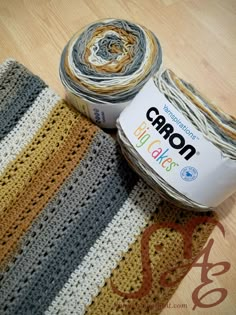 two crocheted rugs sitting next to each other on top of a wooden floor