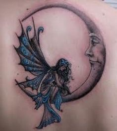 the back of a woman's shoulder with a blue fairy sitting on top of it