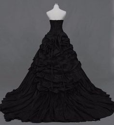 a black wedding dress on a mannequin