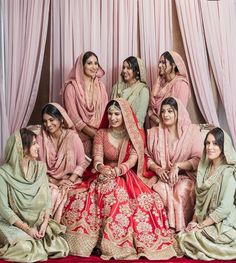 a group of women sitting next to each other