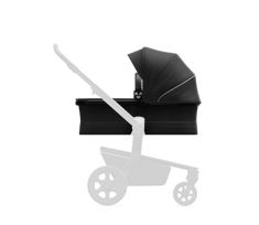 a black and white photo of a baby's stroller